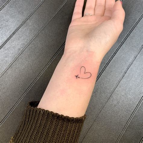 simple tattoos small|small unique tattoos for women.